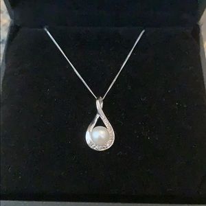 Pearl necklace on silver chain